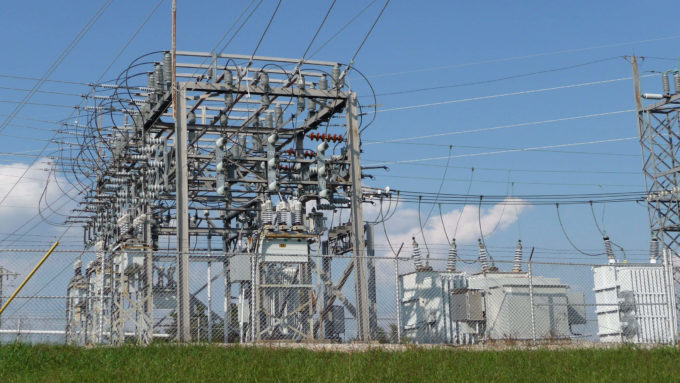 Small electrical utility site with grass in front