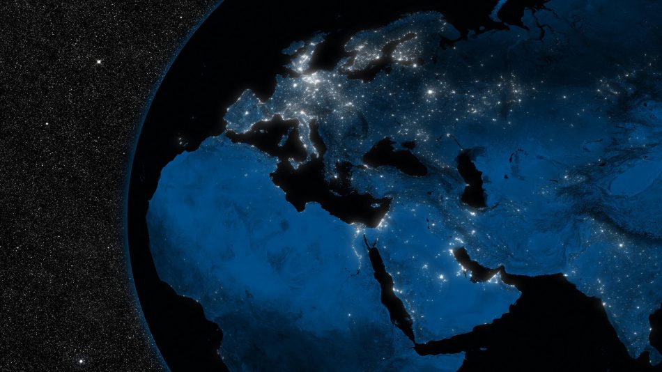 Night in Europe, Middle East and Africa region with city lights viewed from space