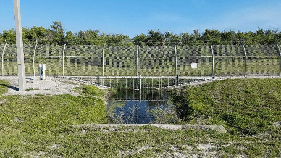 FiberPatrol running along a culvert protection gate at a site in Florida