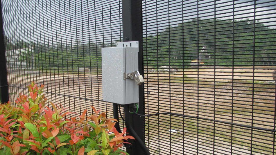 FlexZone ranging fence-mounted intrusion detection sensor on a welded-mesh fence