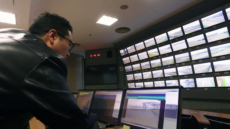 Man viewing Symphony VMS footage at the Shanghai International Circuit