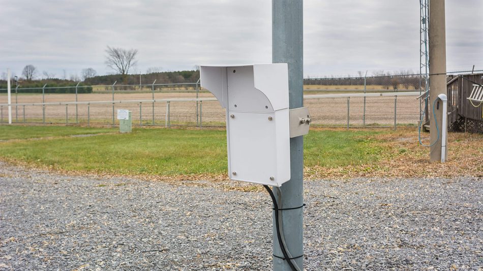 UltraWave microwave intrusion detection sensor unit attached to a pole